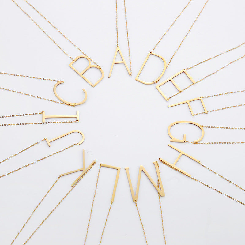 GOLDTONE MONOGRAM NECKLACE
